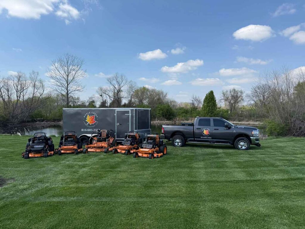 Maple Creek Landscaping work vehicles.